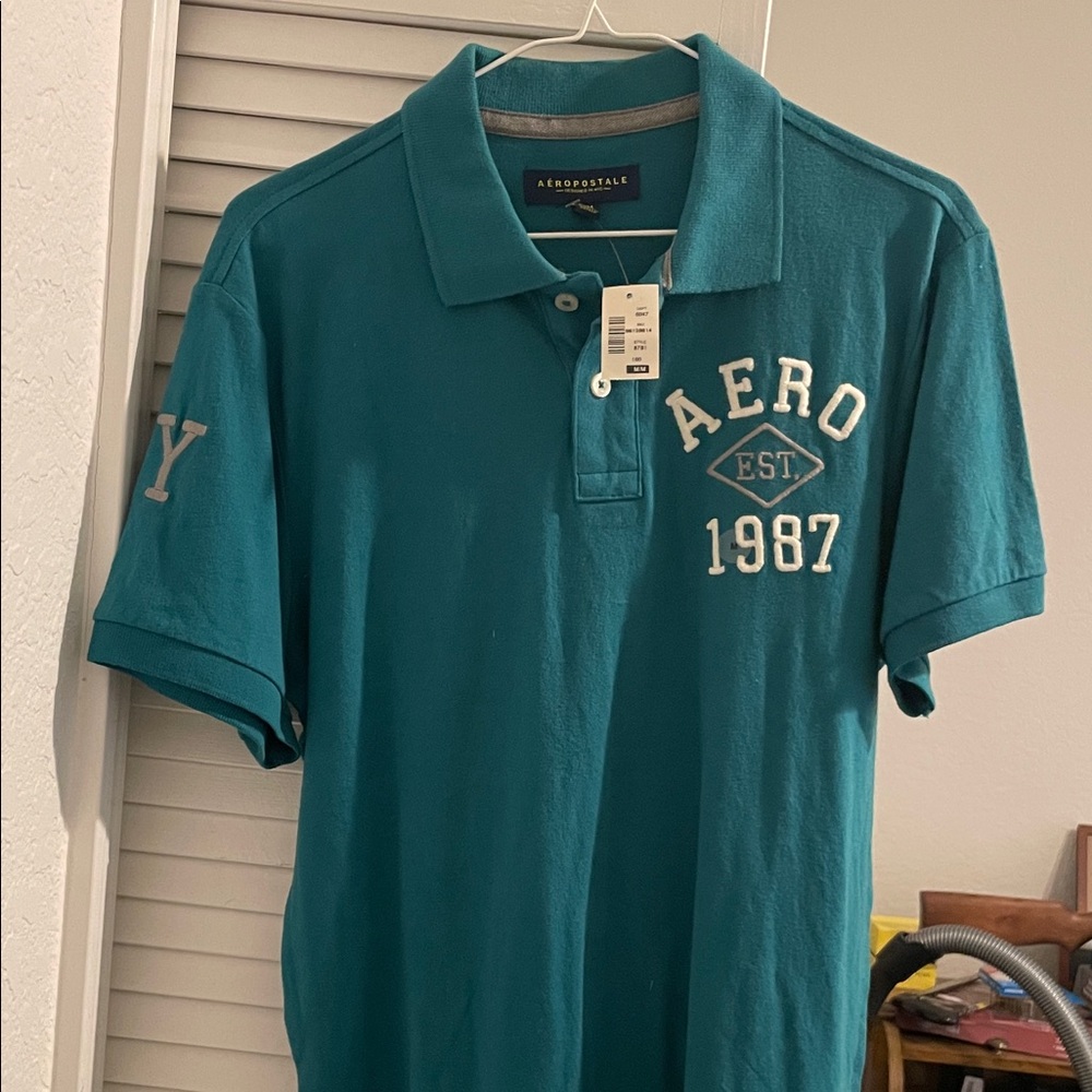 3/$30 Aeropostale Teal Graphic Polo